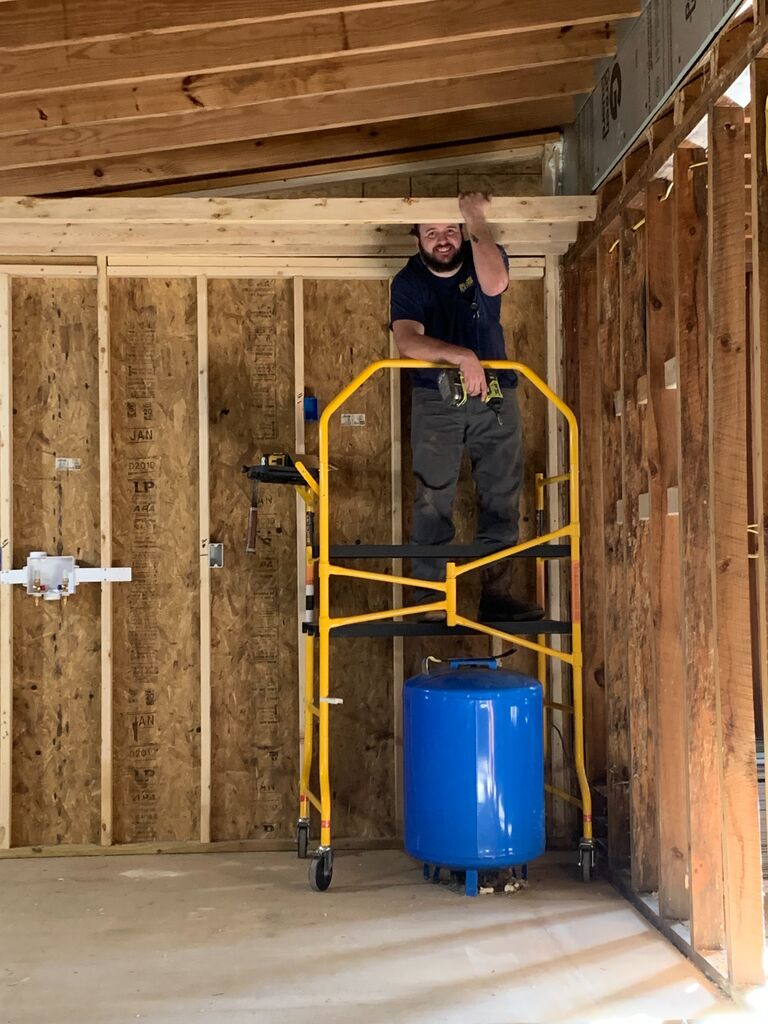 Framing in the ceiling in what would become our laundry and utility room