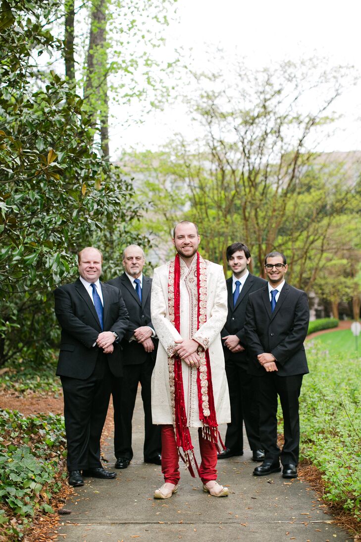 Groomsmen In Suits With Groom In Traditional Indian Wedding Attire