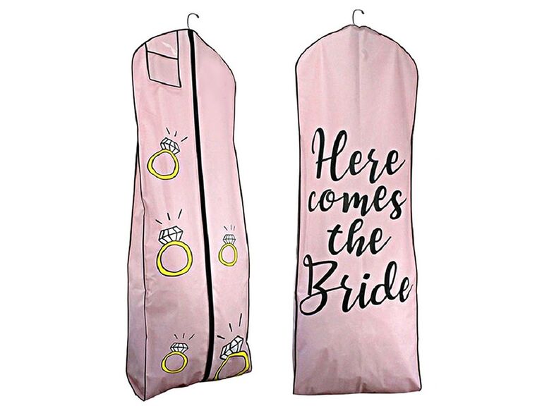 Pink bag with ring graphics on front and 'Here comes the bride' in black on back script