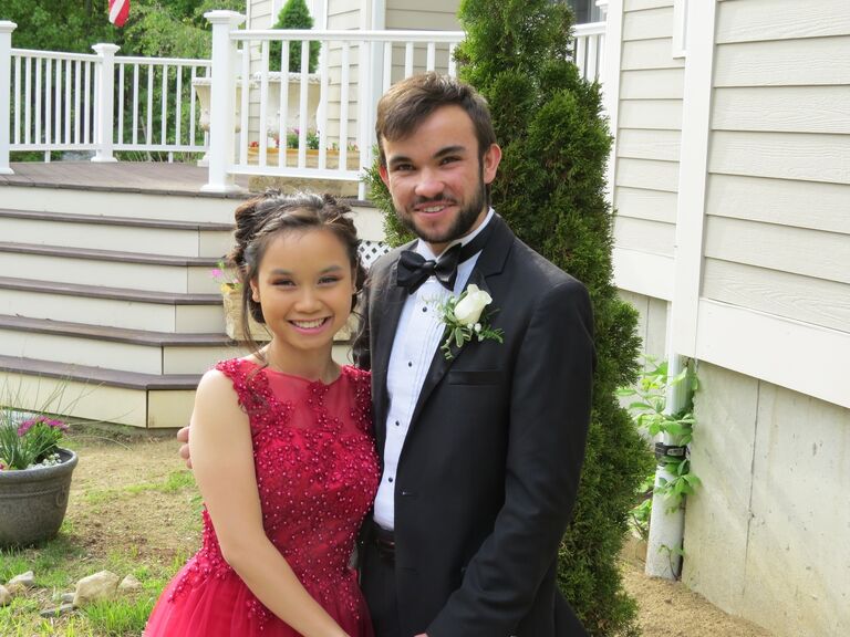 Emily and Chris attended her prom atop State Street in Boston . 