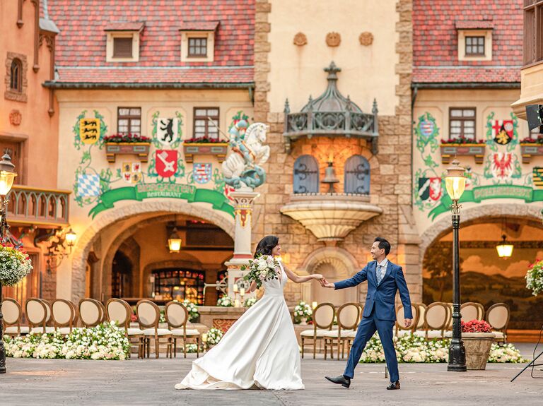 Couple walking through EPCOT's Germany Pavilion at Walt Disney World Resort in Orlando, Florida