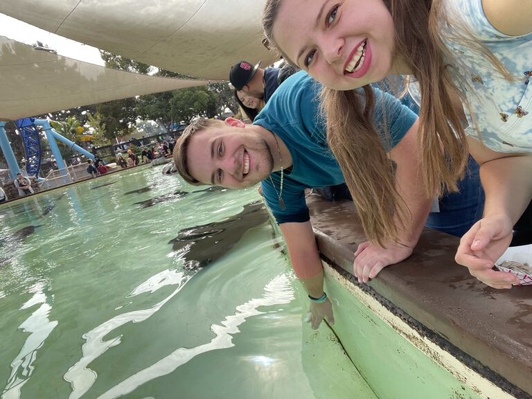 Cam taught Blake all the traditions of SeaWorld; they feed the manta rays and rode the Manta ride numerous times.