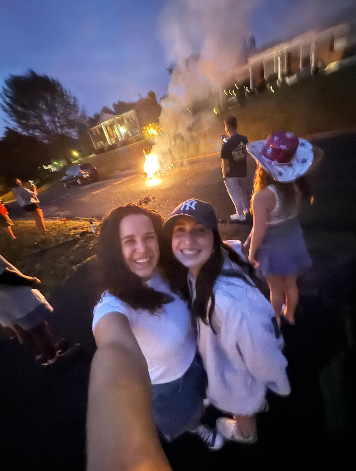It all began when Em randomly ended up at Michael's house on July 4th. She was supposed to work that night and had no plans, but then got put on call. Her friend, Peyton, was friends with one of Michael's good friends, Anna, and invited Em to go to this fourth of July party with her. You can see Michael in the background of this selfie.