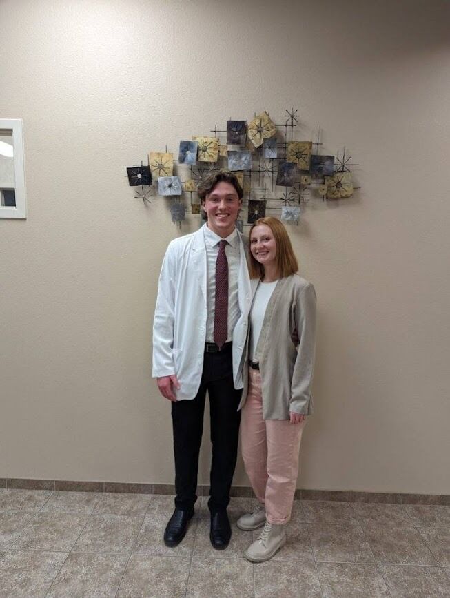 This is us after Cole's white coat ceremony for the Respiratory Therapy Program at UMary! He started clinicals shortly after, and he's looking forward to accepting a job offer at Mayo Clinic! 