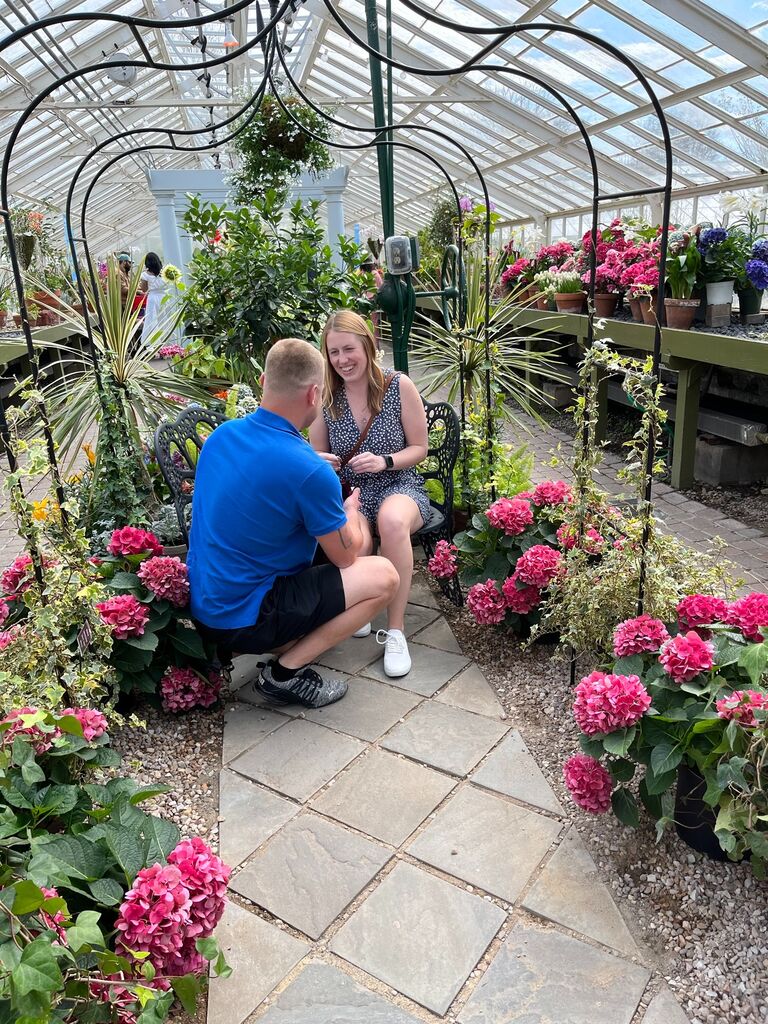 She said YES!
Bryce proposed to Morgan at the Botanical Gardens in Buffalo, NY. While Morgan knew it was coming some day, she was completely surprised! He then surprised her with dinner at a restaurant where she was greeted by her family and friends.