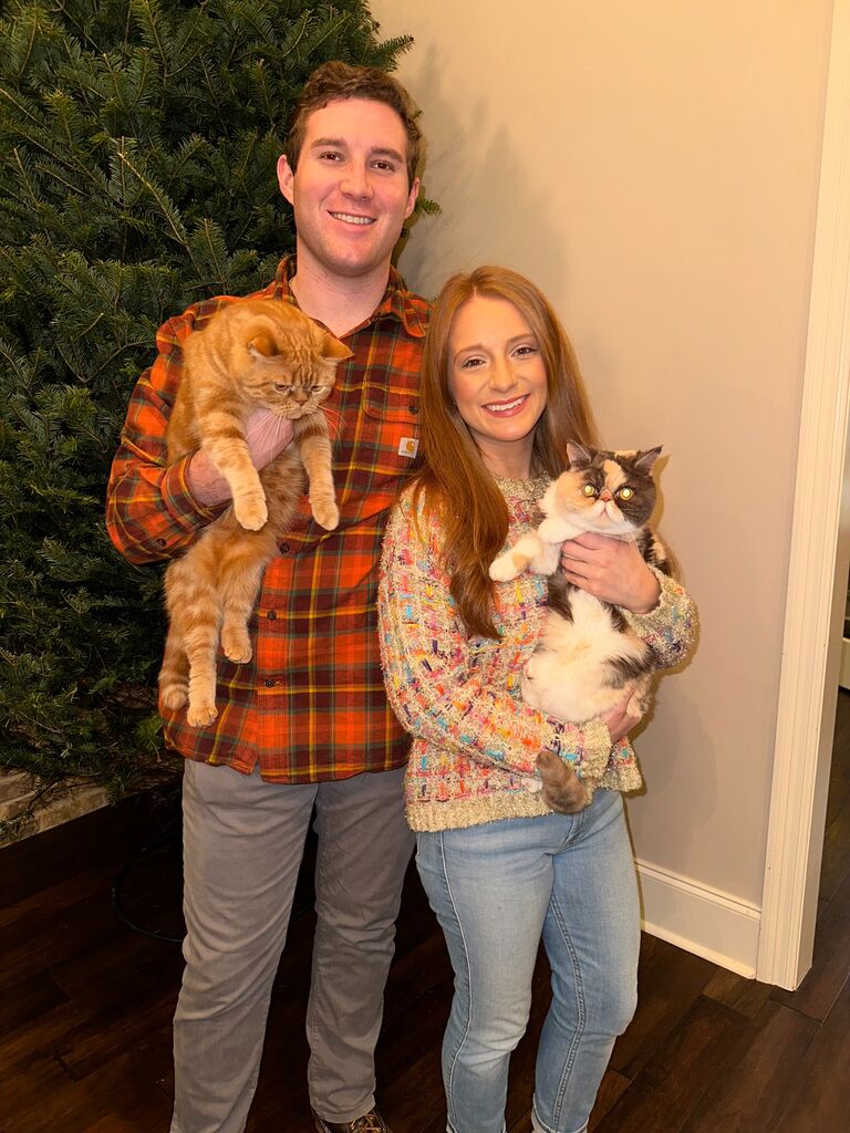 A family photo after bringing home their first real Christmas tree. Jordan's favorite time of the year is Christmas. It was always her dream to have an intimate proposal in front of her Christmas tree.