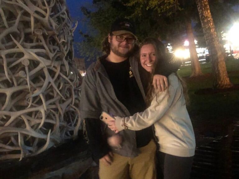 This was our first picture as an official couple in Jackson Hole, Wyoming. We became official on May 10th, one week after we met. We took a long walk at midnight on the boardwalk in the geyser basin surrounding Old Faithful. When we got back to the employee dorm after our walk, we had our first kiss and never looked back. 