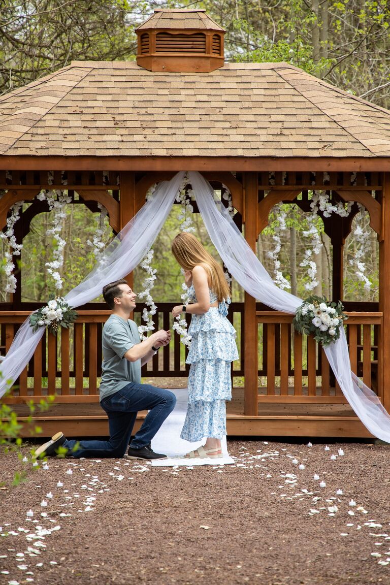 Keith planned a surprise engagement with the help of Heathers sisters. Heathers sister Sydney asked Heather to go to the park to take picture for her sororities Instagram. At the park Keith took Heather on an hour long walk/hike through Bowmans Hill Wildflower Preserve. While they were walking, Danielle decorated the gazebo and coordinated with the photographer. Finally, Keith got down on one knee and proposed to Heather!