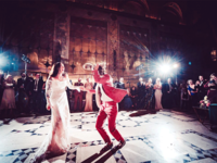 Couple dancing to EDM at wedding