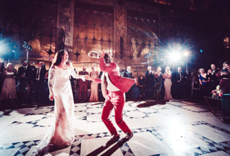 Couple dancing to EDM at wedding