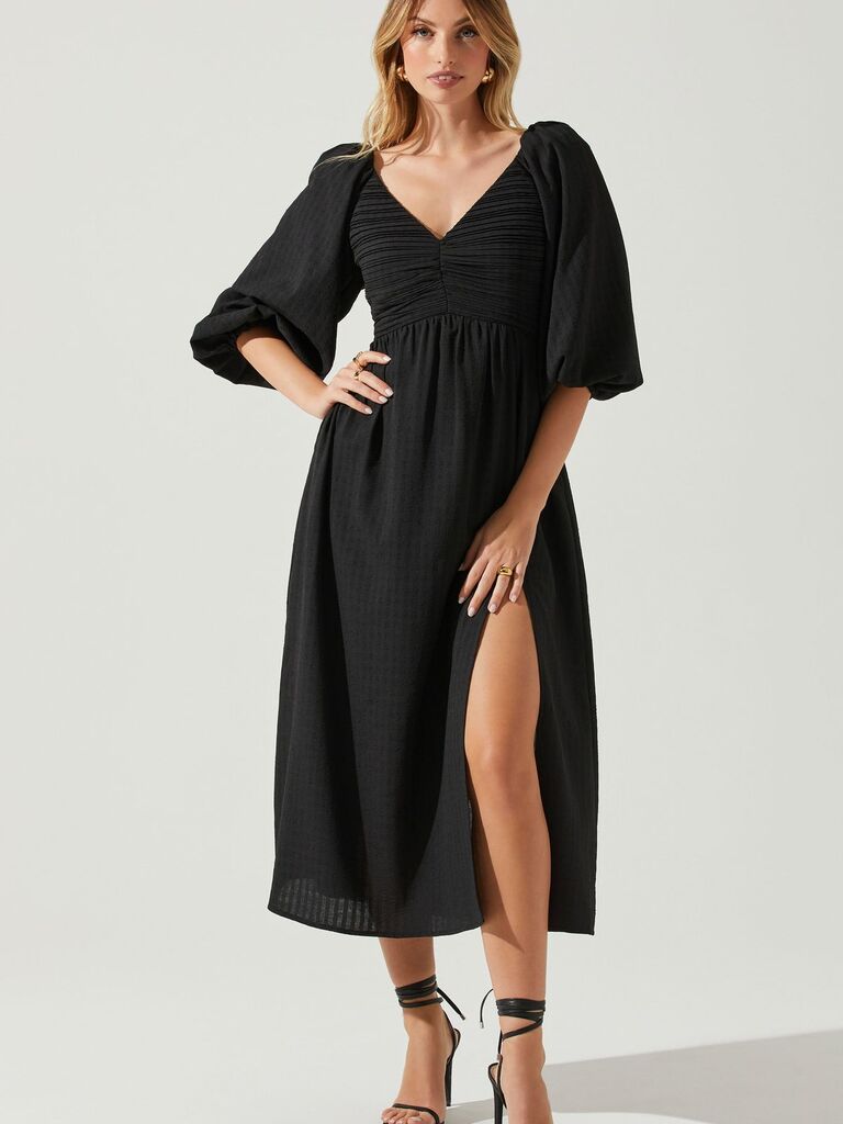 A midi, balloon-sleeved black dress with a v neckline and split hem from ASTR The Label