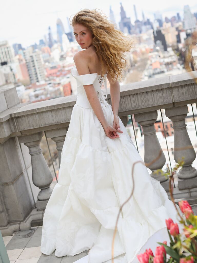Sarah Seven corset back wedding dress with tiered skirt