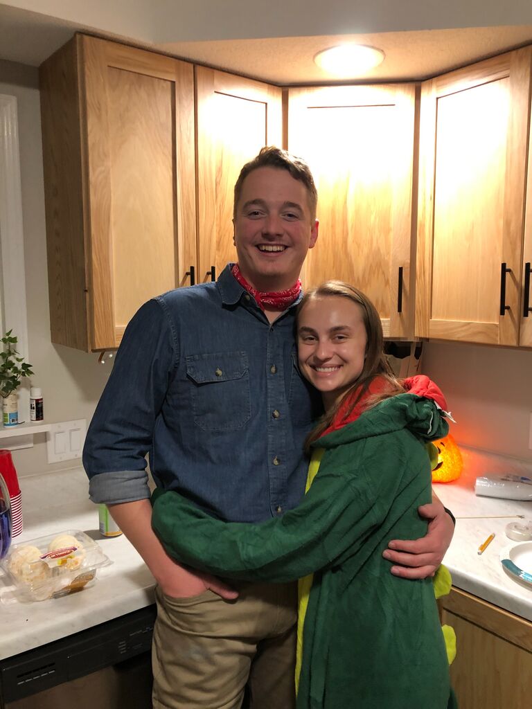 Our first Halloween together. We went as Alan Grant and a dinosaur from the movie Jurassic Park.