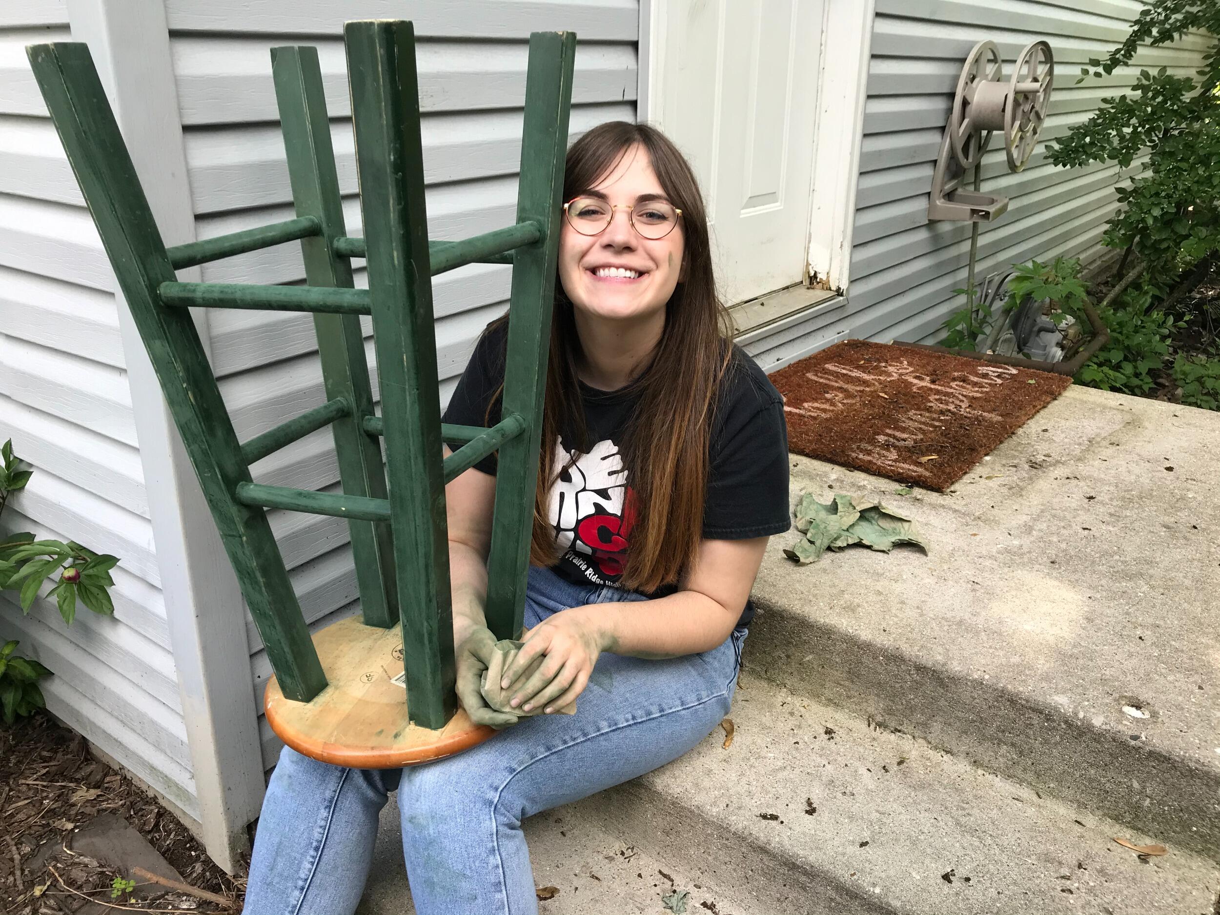Sarah getting ready to paint some stools for our new place...