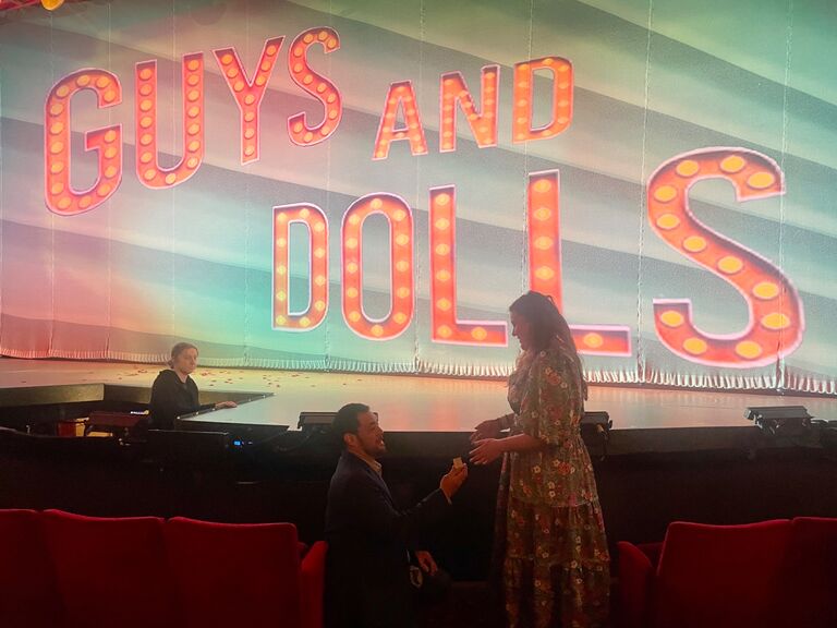 The proposal came after the show was over! He suggested we take a picture in front of the curtain with the show title still on it, and the stranger who offered to take the picture for us also captured some shots (and a video!) of the special moment!