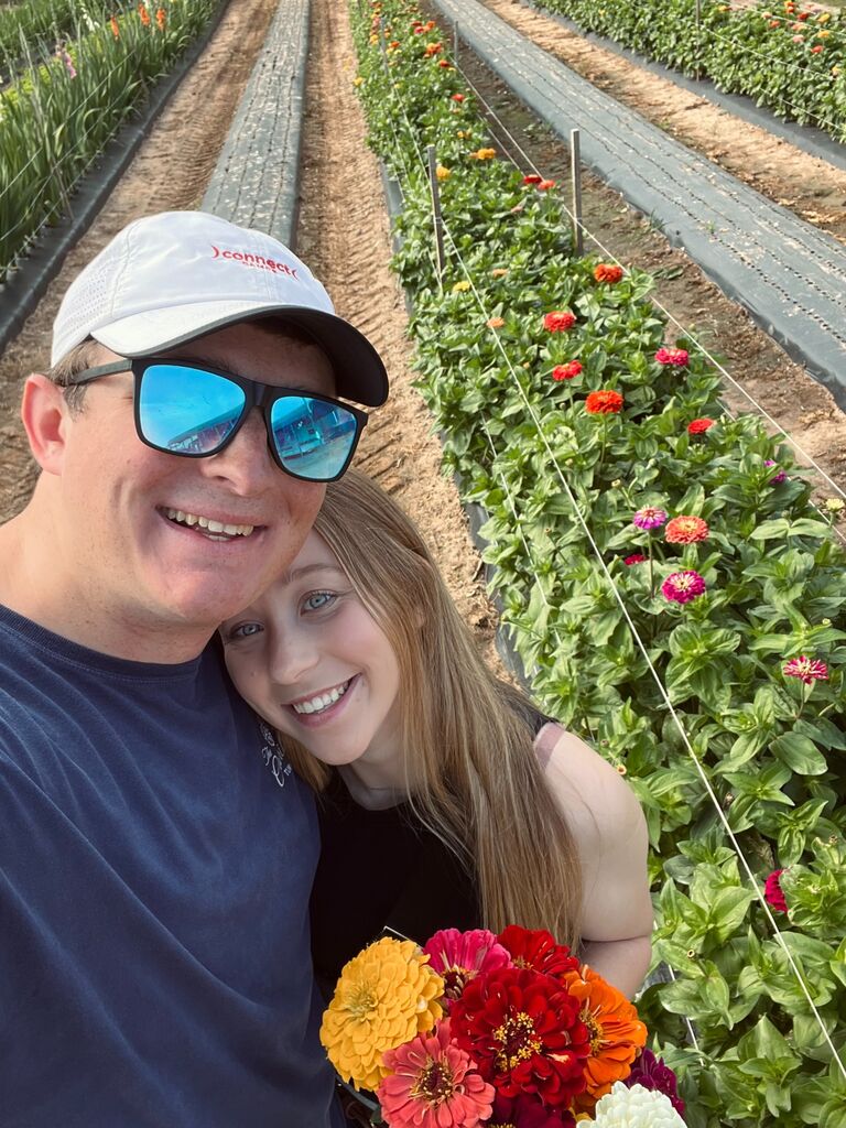 This week I came up to Augusta, GA to meet Caleb's family. He spent the week showing me around Augusta. One of the days, we went strawberry picking. Caleb wandered off while we were there and picked me a bouquet of flowers. To this day, this is still his favorite picture of us. 