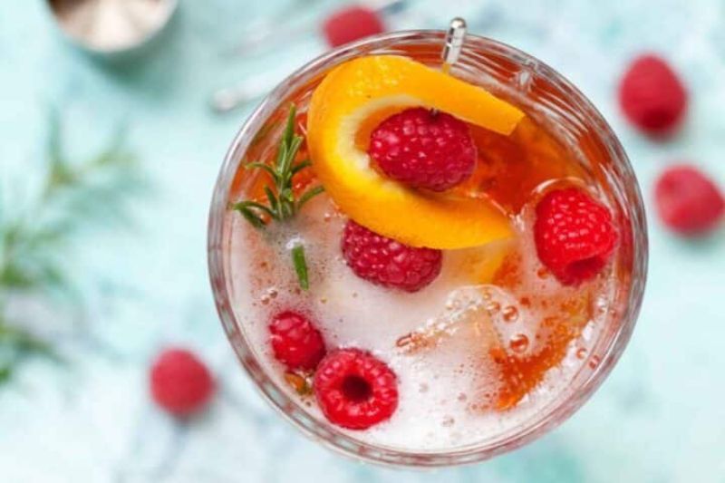 Christmas & Holiday Cocktail Recipes - Christmas Aperol spritz with sloe gin