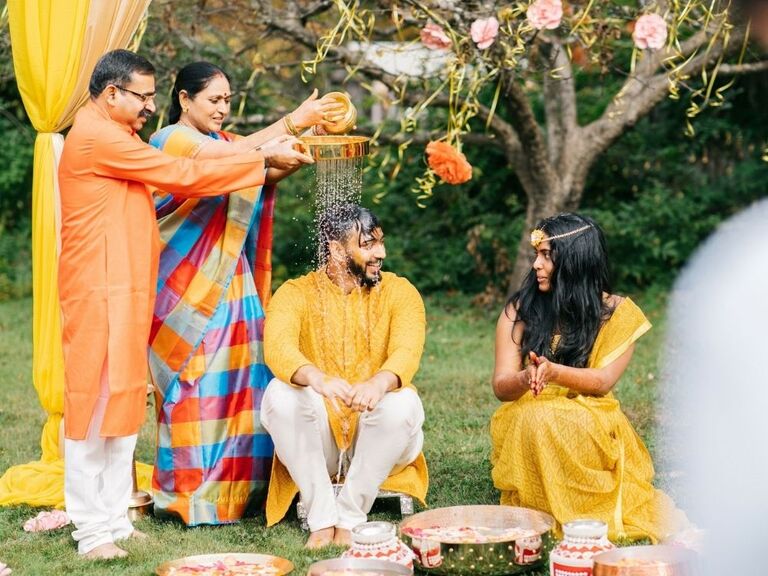 couple during pre-wedding ritual at Indian wedding