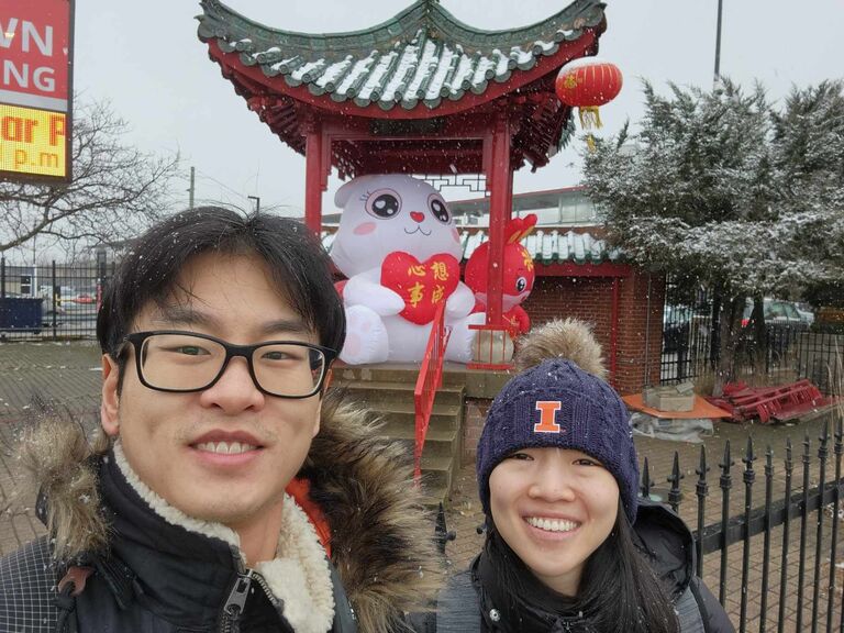 Sophia and Jerry catch a beautiful snowfall in Chicago's Chinatown