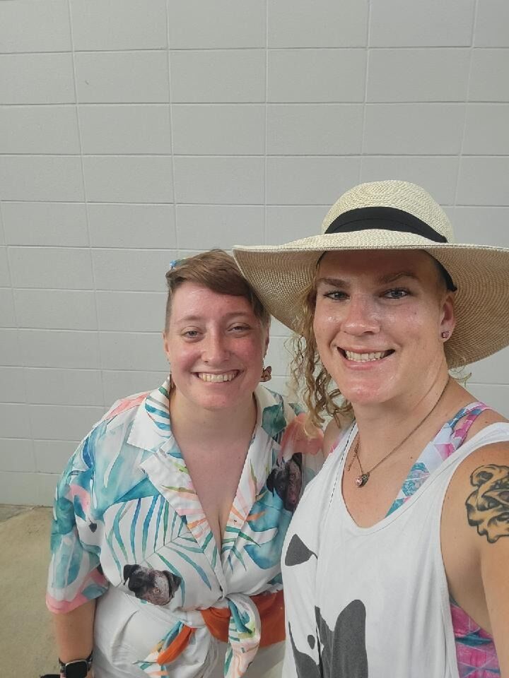 Justine and Tori bring their dog to a Houston Dash (women's soccer) game