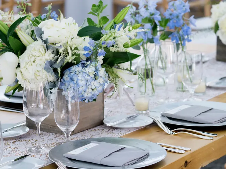 Blue floral wedding centerpieces, taylor swift themed wedding
