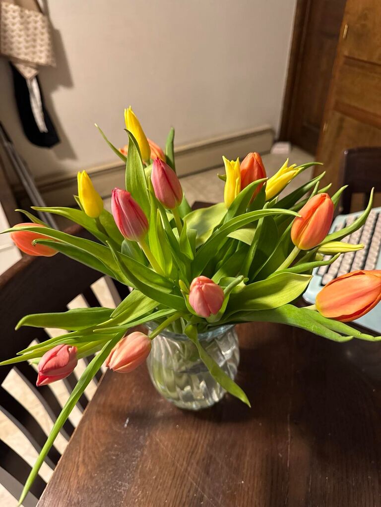 Micaela gets her first flowers.