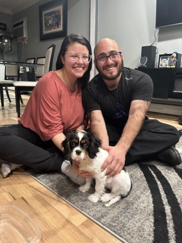 The couple welcomes a pup to their new family - say hi Rainy!