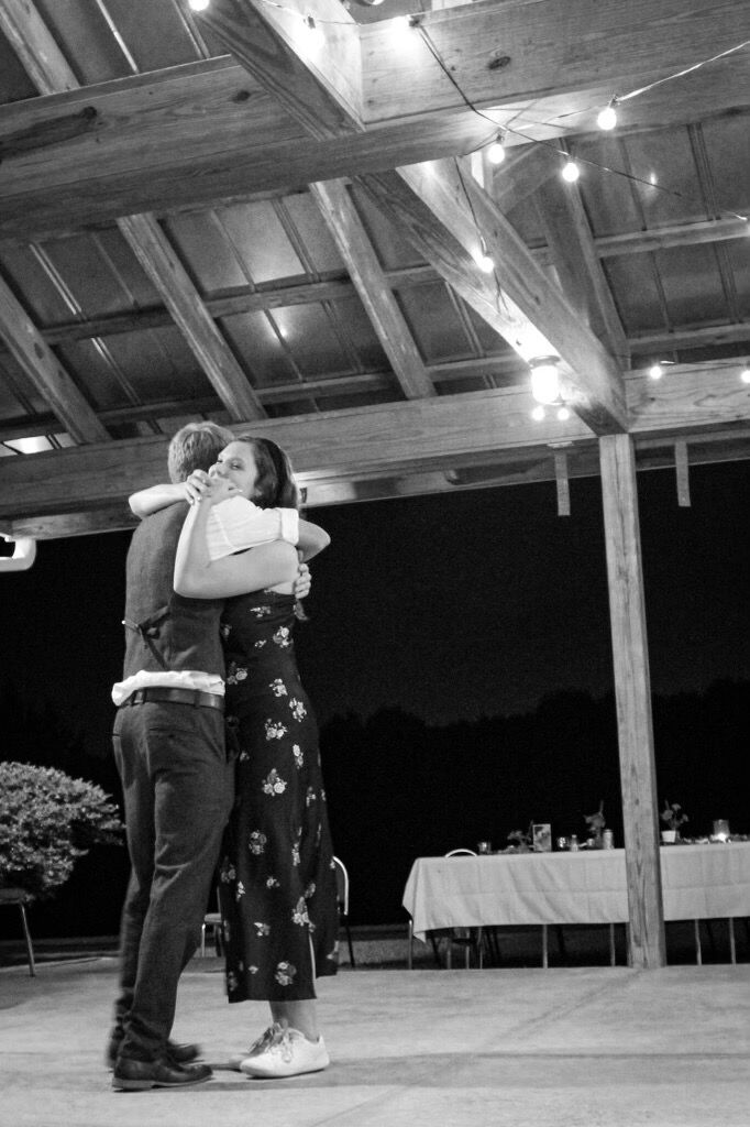 Dancing at his sister's wedding 