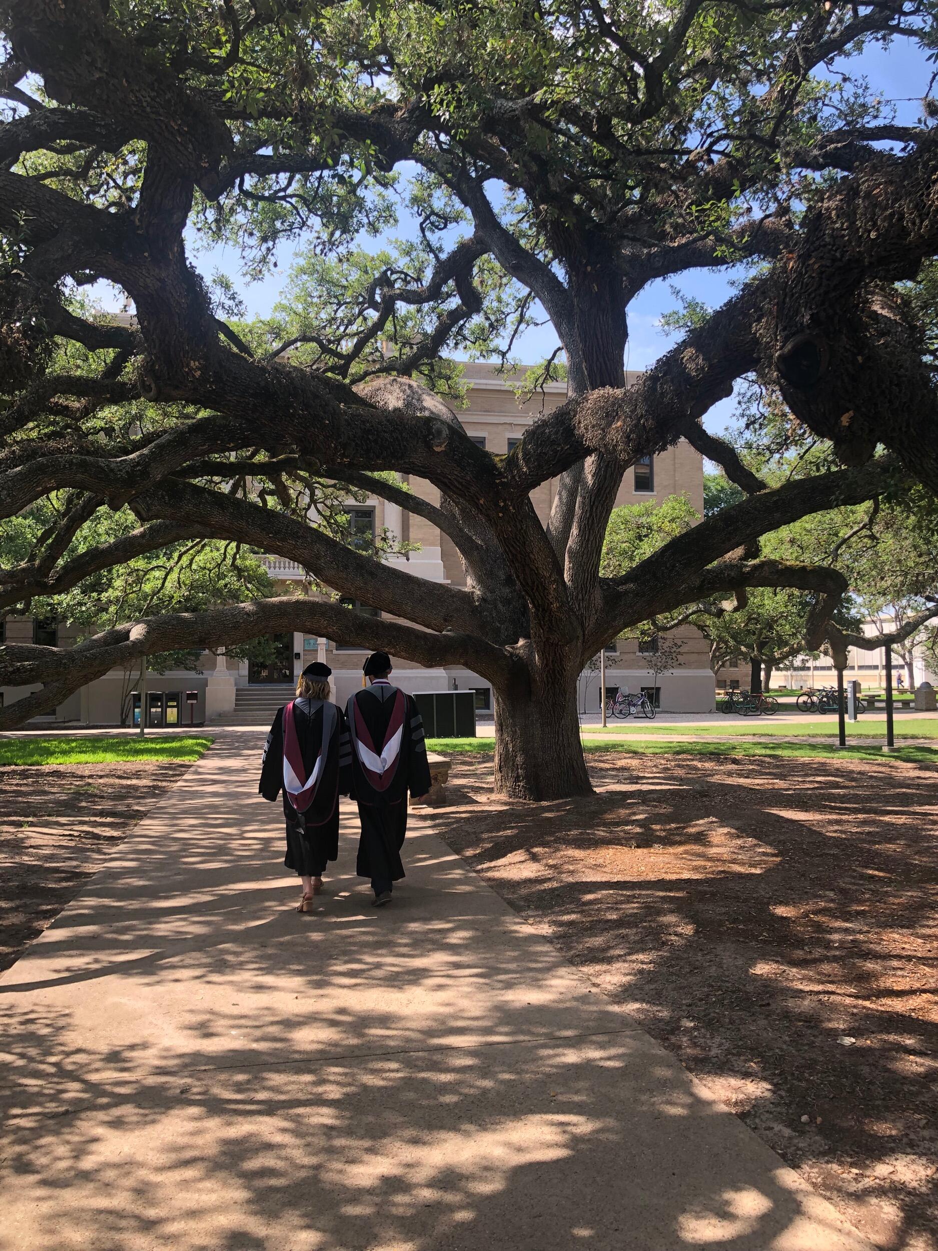 After graduation we followed Aggie Tradition and walked together under the Century Tree.