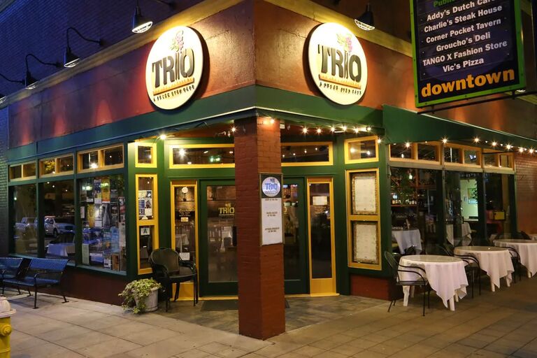 Our First Date: We met at Trio Italian Restaurant. The streets were empty and so was the restaurant. We talked till they kicked us out, which was 8 pm because everything closed early during the pandemic. Then we stood talking in the parking garage until midnight. This was a good sign. 