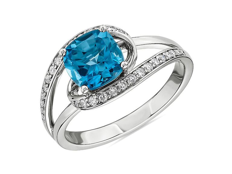 blue nile split shank engagement ring with cushion cut topaz center stone and diamond encrusted and plain white gold band