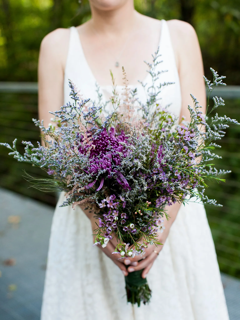 Purple floral wedding bouquet, taylor swift themed wedding