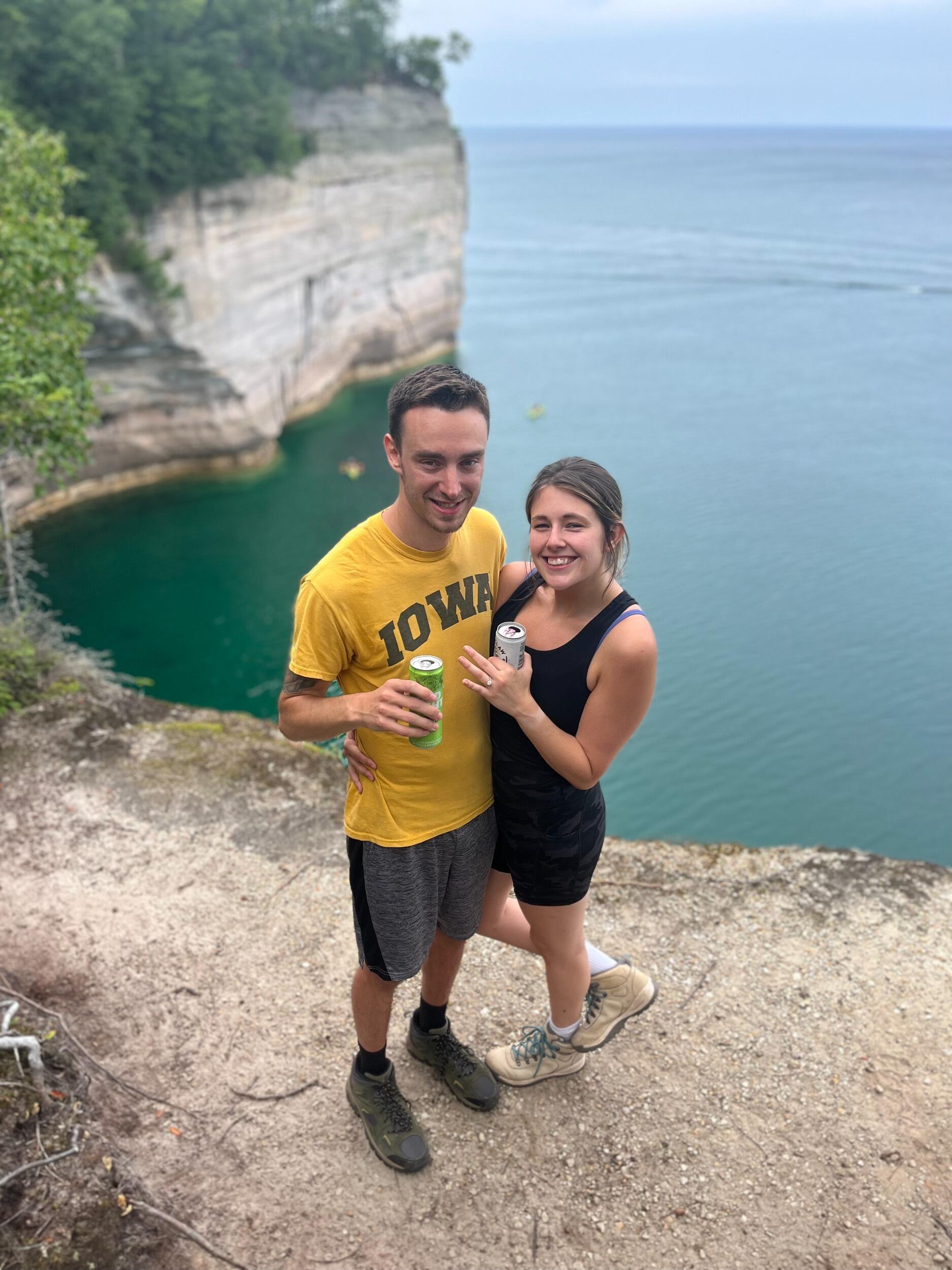 We got engaged at Pictured Rocks in Michigan, celebrated with white claws at the top until our tent flooded that night and we slept in the truck 