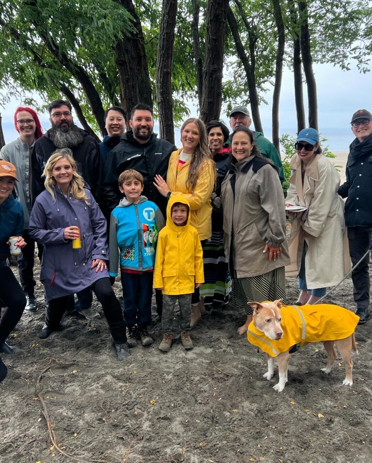 We got engaged during a rainy day in Seattle at Golden Gardens Park.
