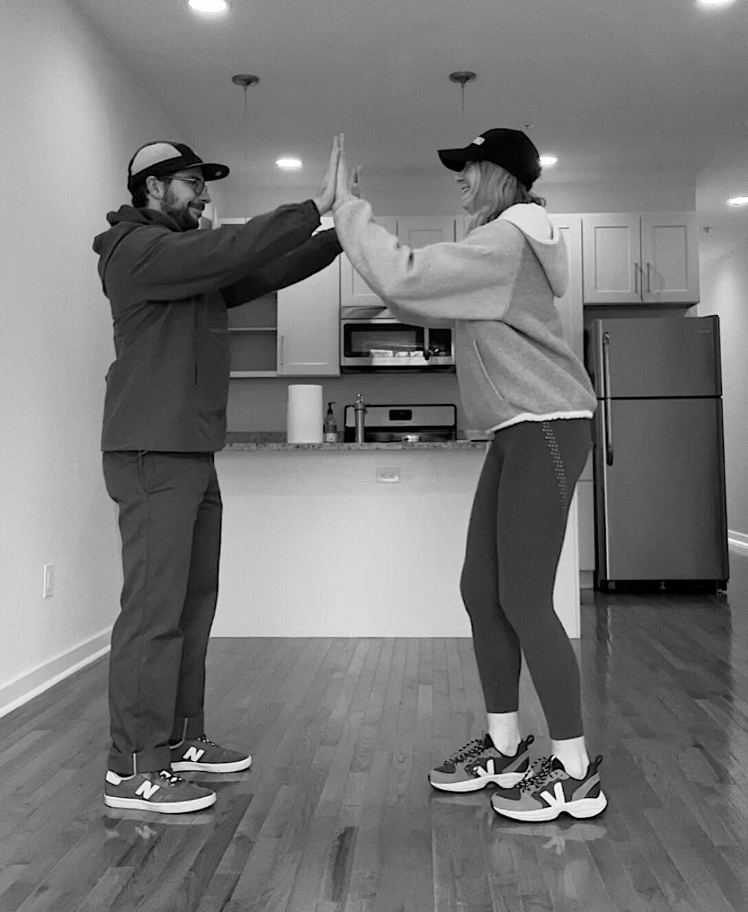 we moved into an apartment together (pictured here doing our secret handshake after signing our lease!) and we're so proud of the life we've built together in philly.