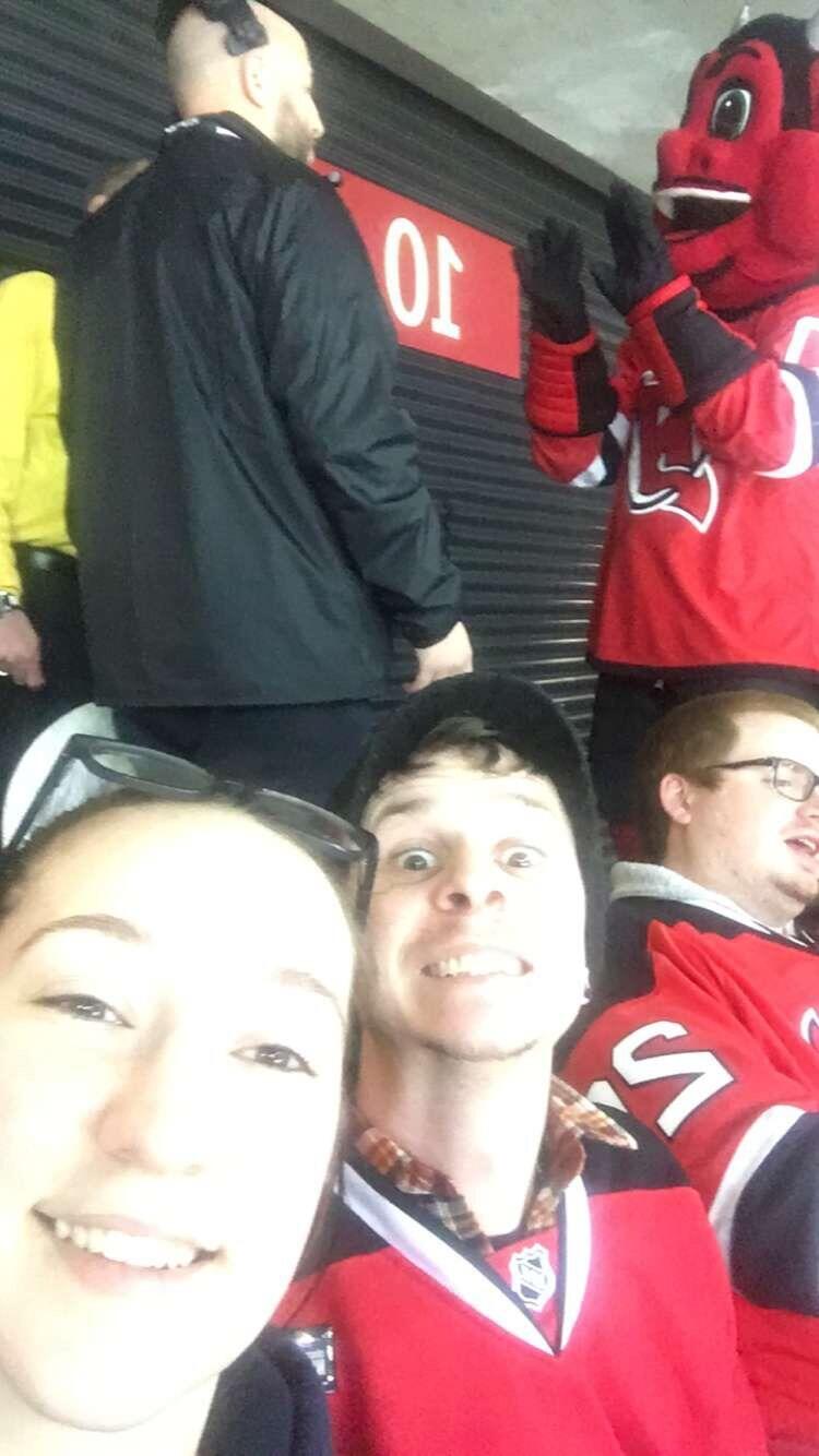 and he got her to go to her first of MANY, hockey games (Go Devils!)