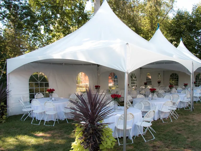 White outdoor wedding tent rental from Party Time Rentals in Altamonte Springs, Florida