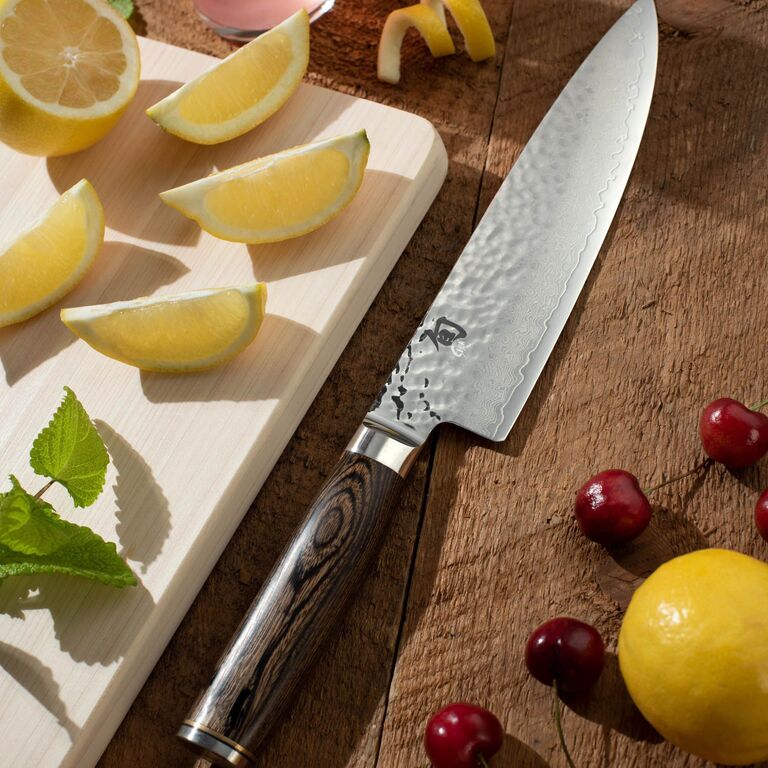 Shun eight-inch chef's knife with dark wood handle