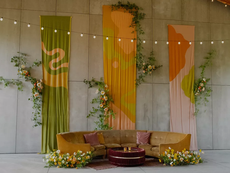 Orange 70s-themed wedding backdrop