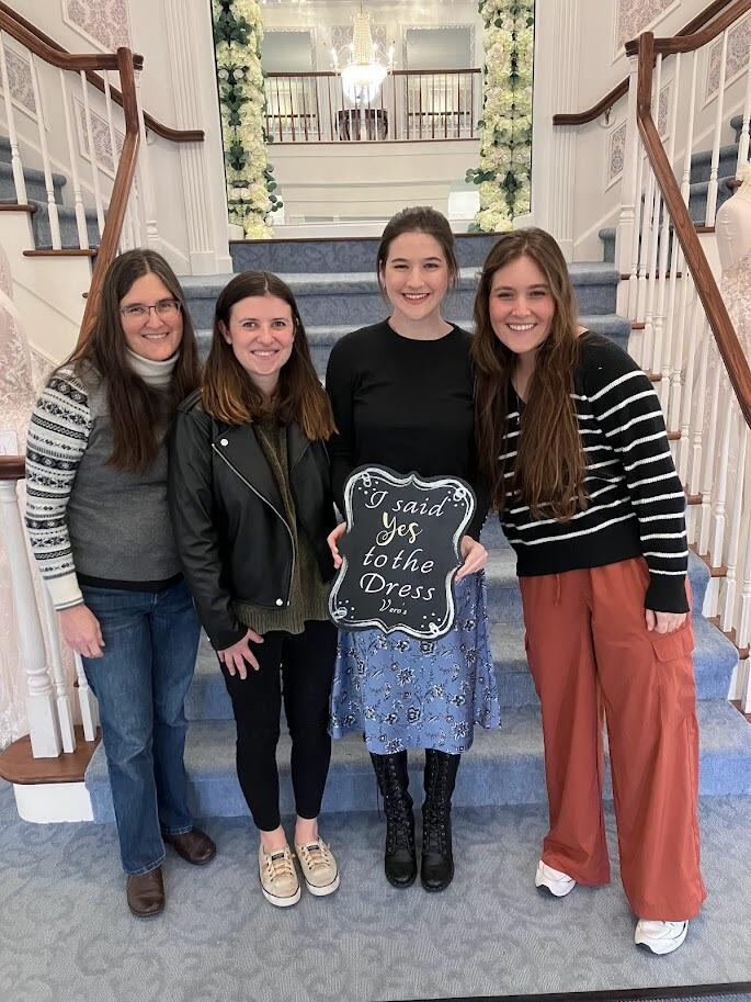 Hannah found a wedding dress with Allie, Malee, Hannah's mom and baby Raine!