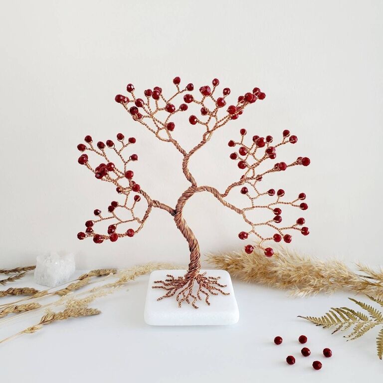 Red gem and copper wire tree sculpture