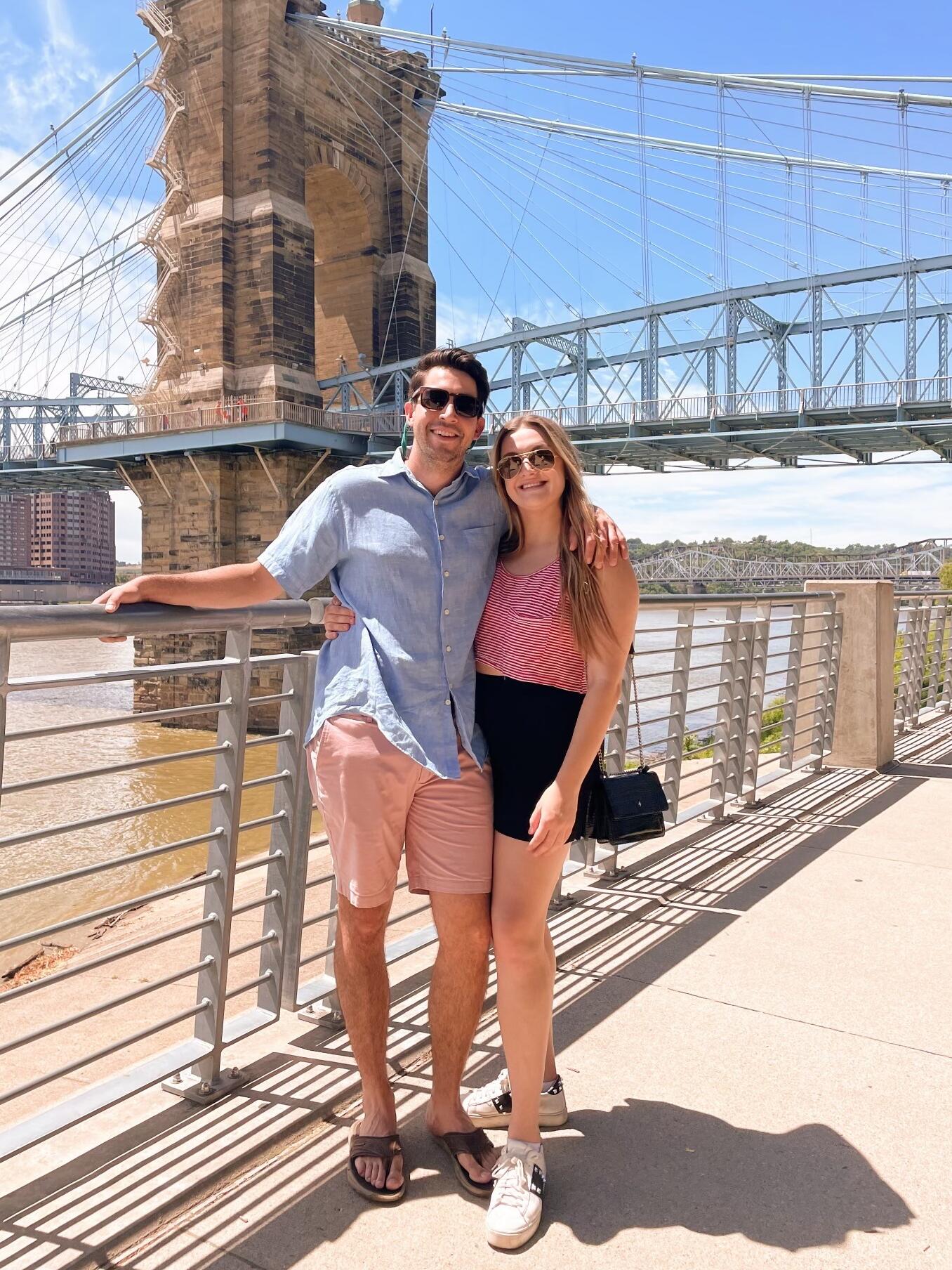 By November, the threads of their lives intertwined further as Matt made a bold move—packing his bags and following his heart to Cincinnati. Together, they created a life filled with laughter, which became even busier after they adopted their kitten Scarlett and their pup Kara. They began building their own memories and establishing their own traditions at some of their favorite places like Marco Island, Hawaii, and Boston.