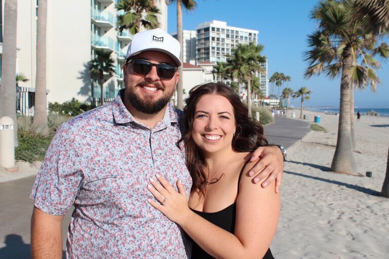 The day he finally did!! He surprised me at the Hotel Del on the beach with roses arranged in the sand, while our families waited in the background. It was my favorite place with my favorite people! He did good :)