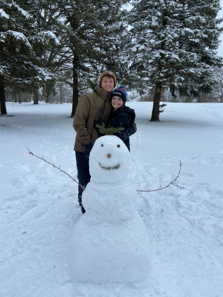 We went sledding and built a snowman with friends! Meet Sebastian. 