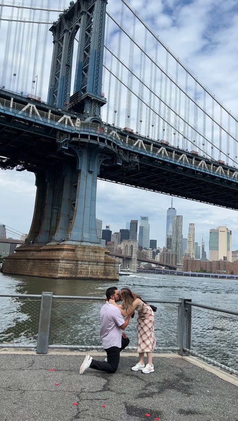 July 3, 2023, Daniel proposed in Brooklyn, NY. 30 seconds after this picture was taken, Kelly started wedding planning.