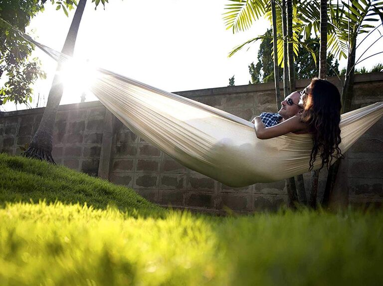 This handy under-desk hammock is the perfect way to nap at work