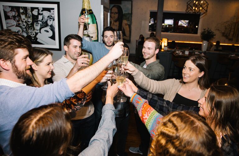 Celebrating our engagement with our friends at our surprise engagement party