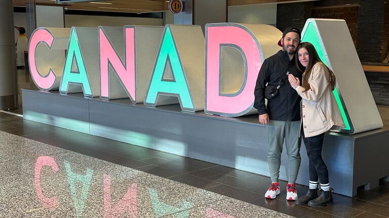 Brett proposed at the Calgary Airport!