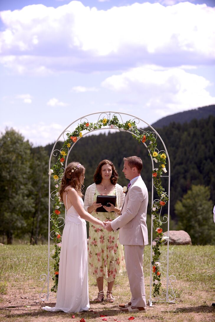 Rose And Daisy Decorated Wedding Arbor