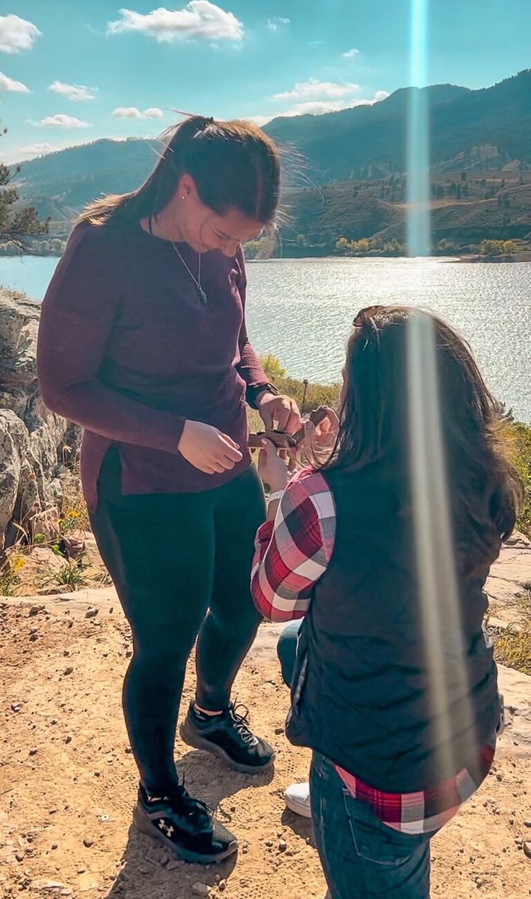 Taylor surprised Sam and proposed the next day on another hike!